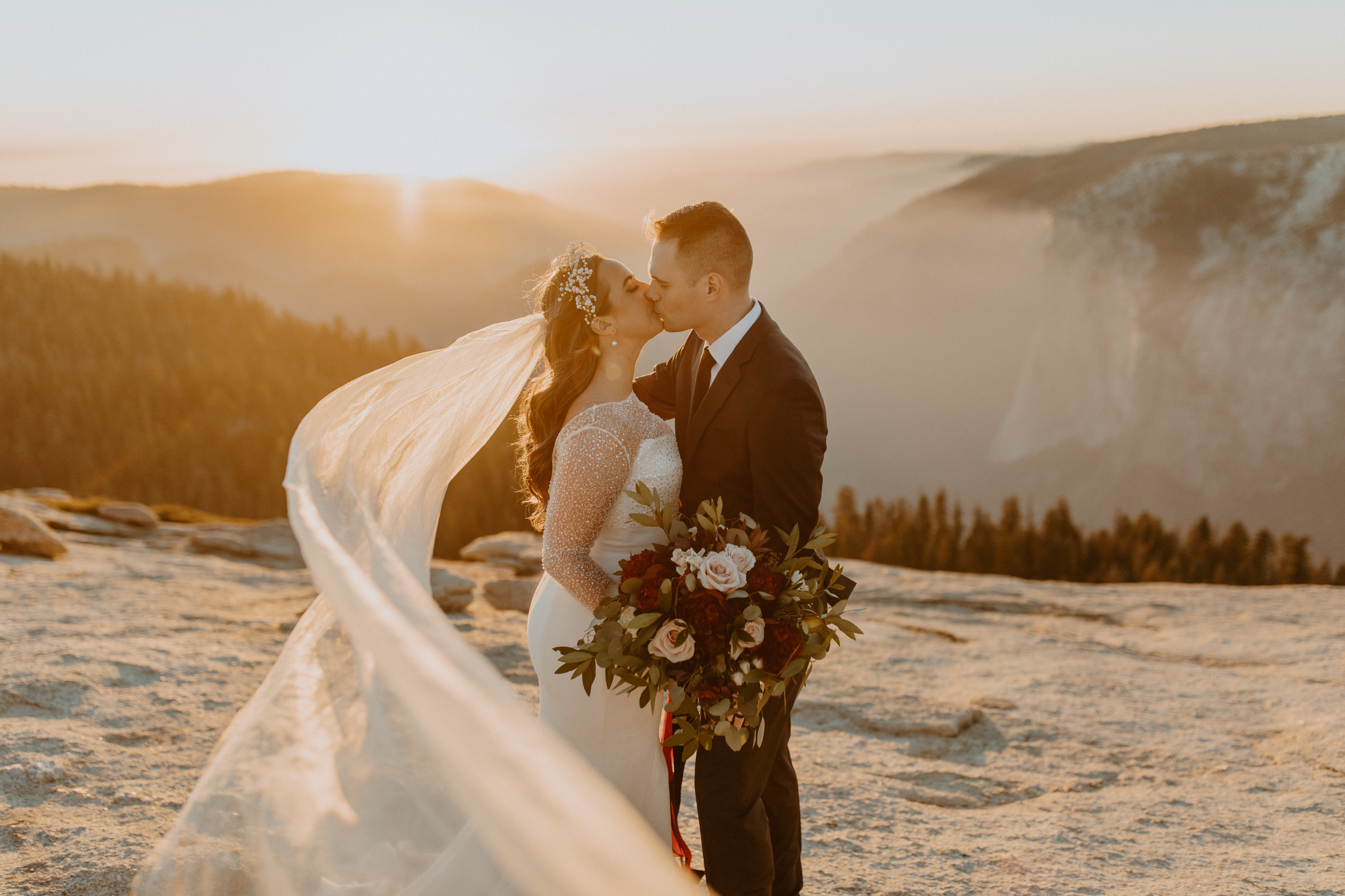 bride and groom eloping in Yosemite at sunset