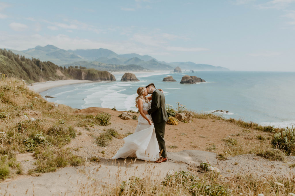 Bride and Groom in Ecola State Park on a bluff above Canon Beach 