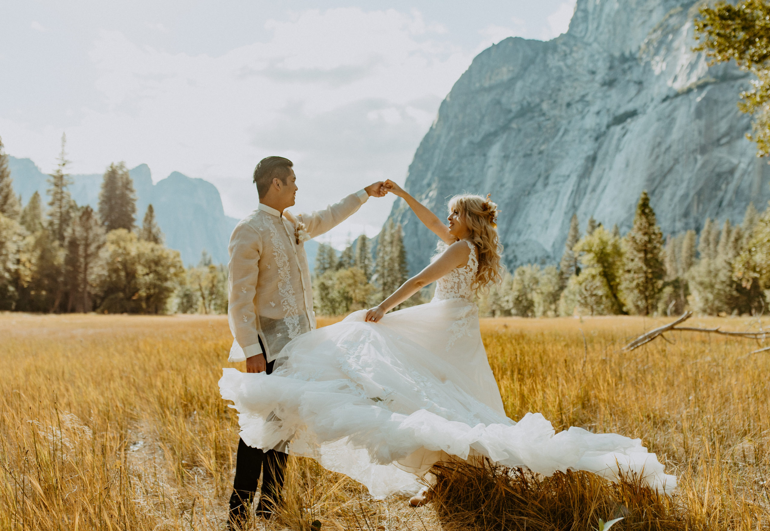 the couple twirling in Yosemite Valley