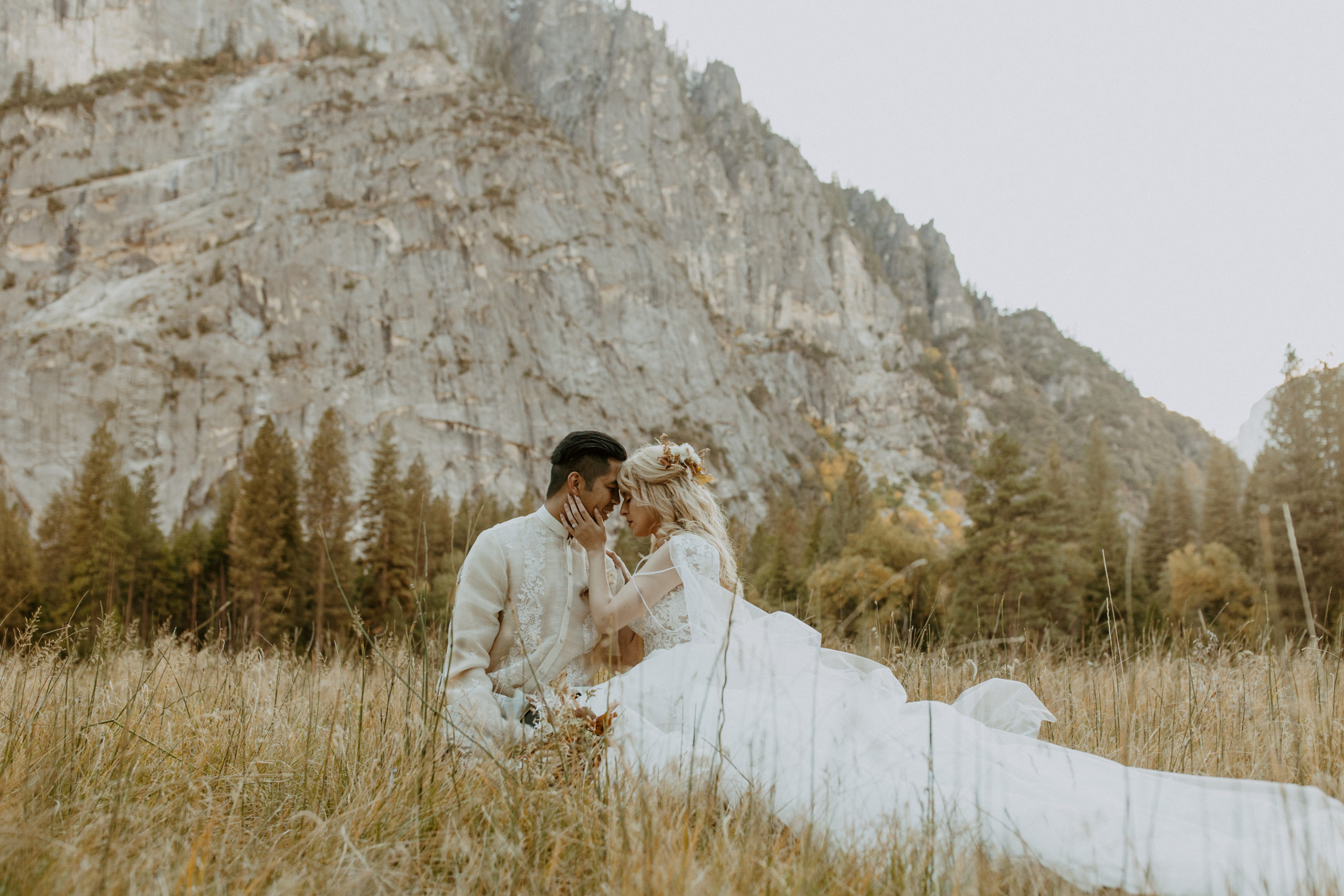 the couple sitting in the Yosemite Valley