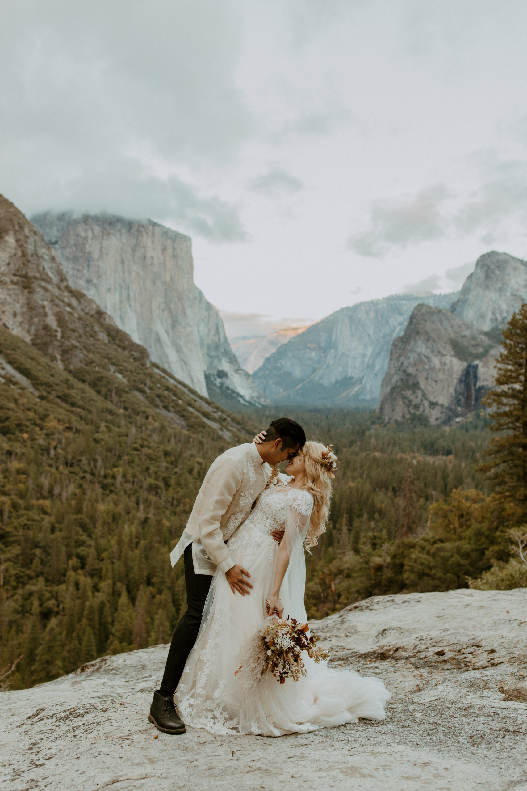 the couple at the elopement in Yosemite at Tunnel View