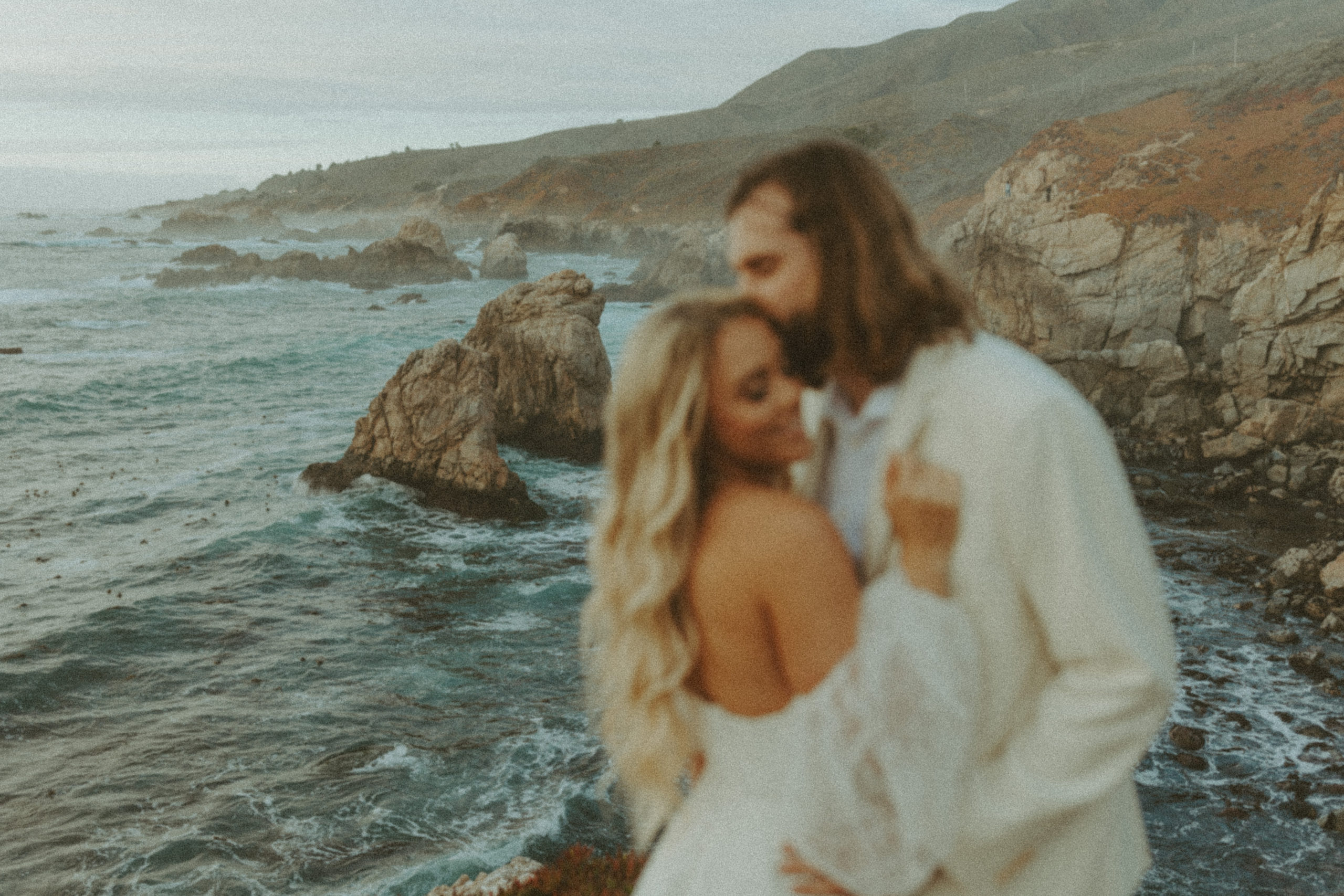 the couple hugging at Big Sur