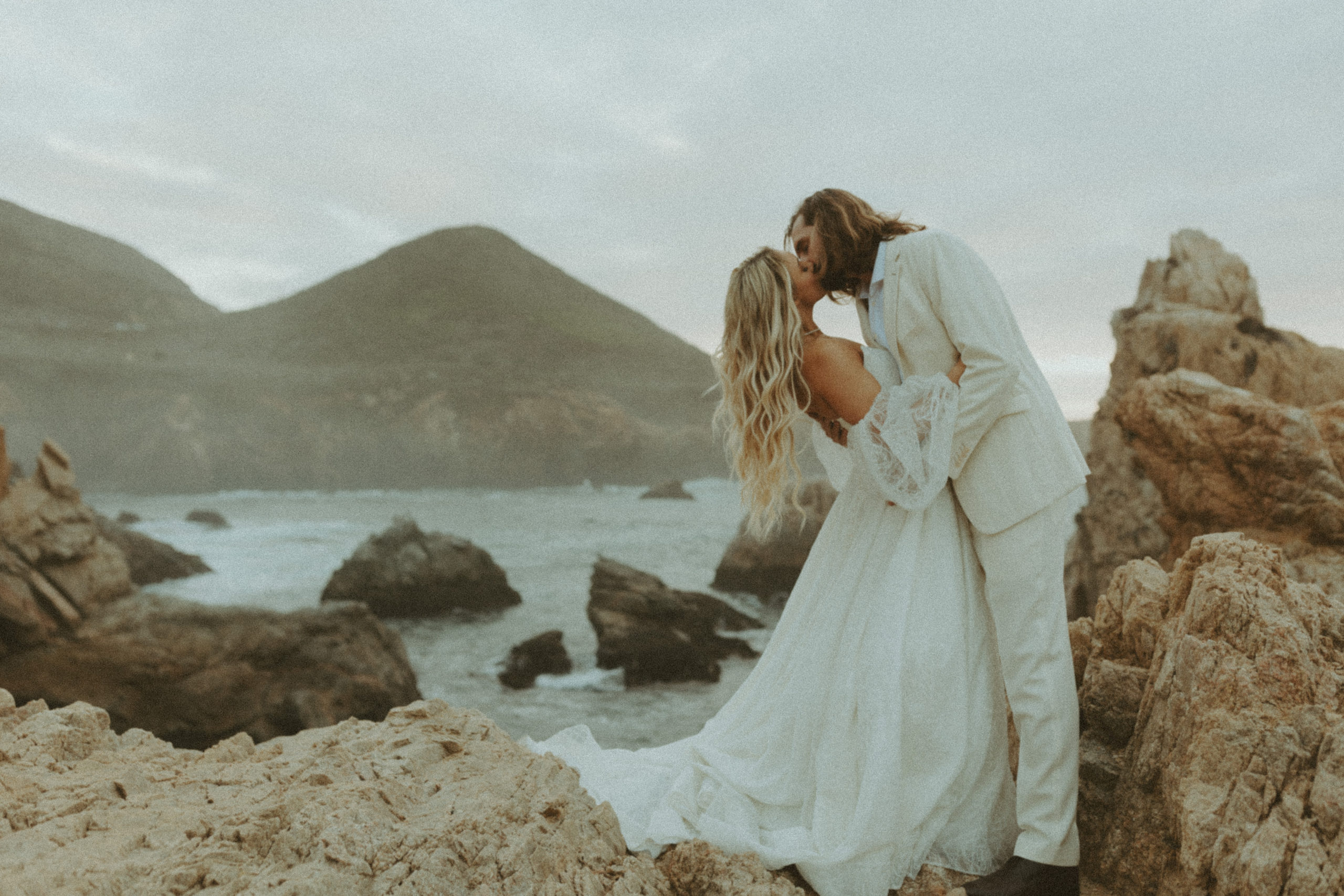 the couple kissing at Big Sur for wedding photos