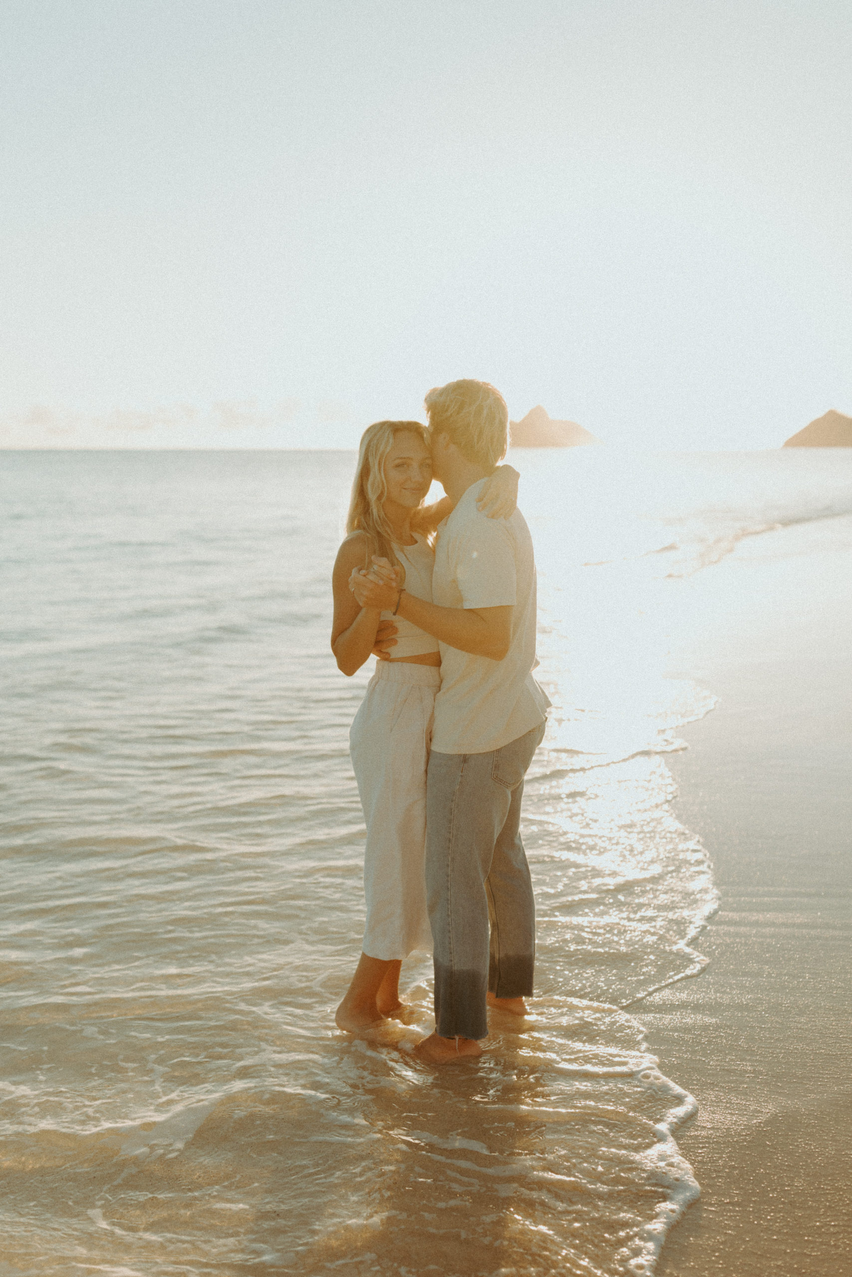 the couple slow dancing on the beach