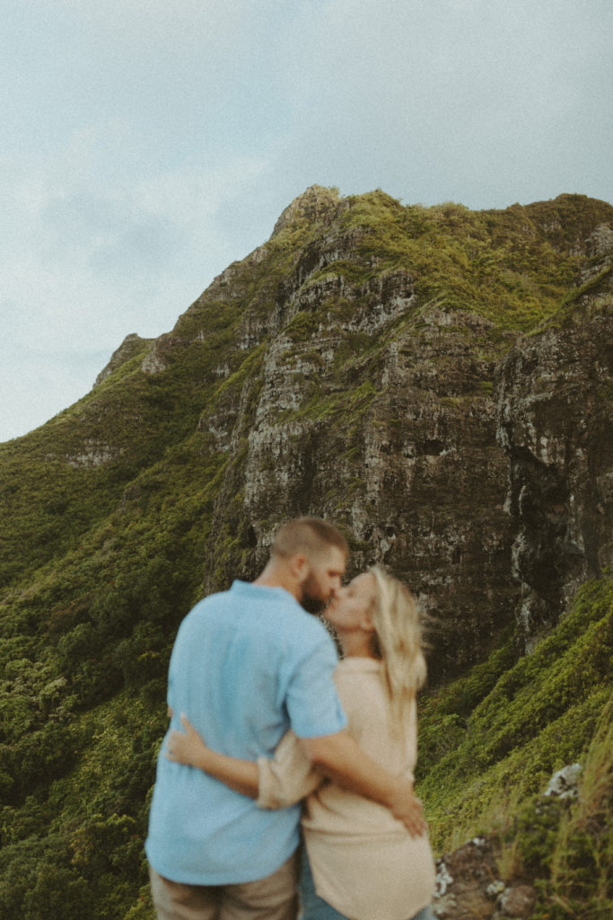 the couple kissing during their adventure couples photoshoot in Hawaii
