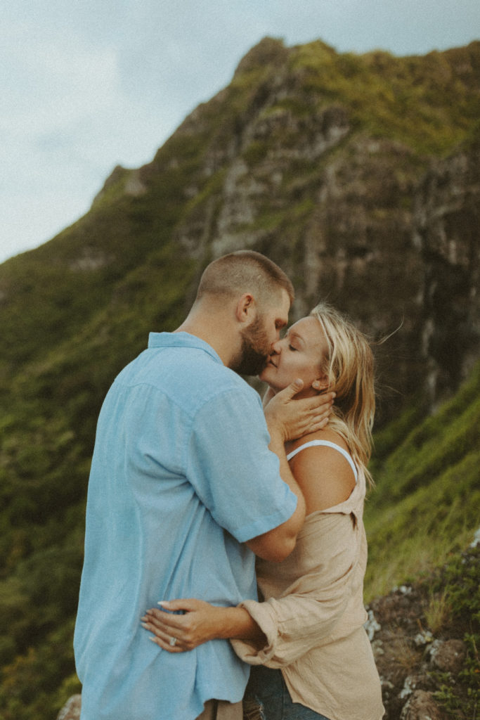 the couple leaning in for a kiss for adventurous couple photos