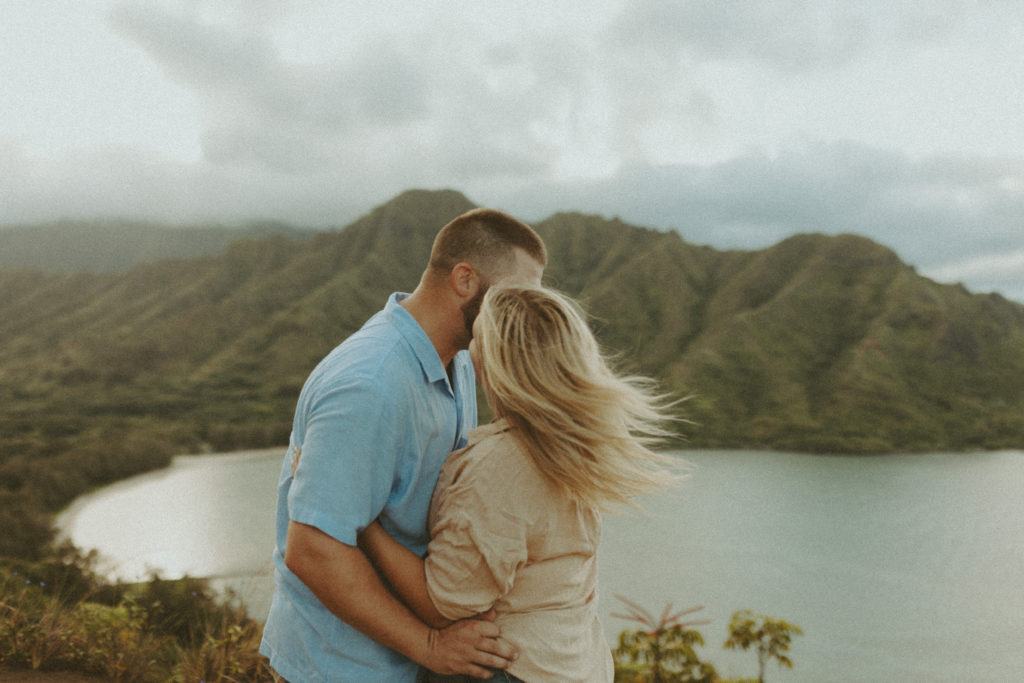 the couple closely together for anniversary photos in Hawaii
