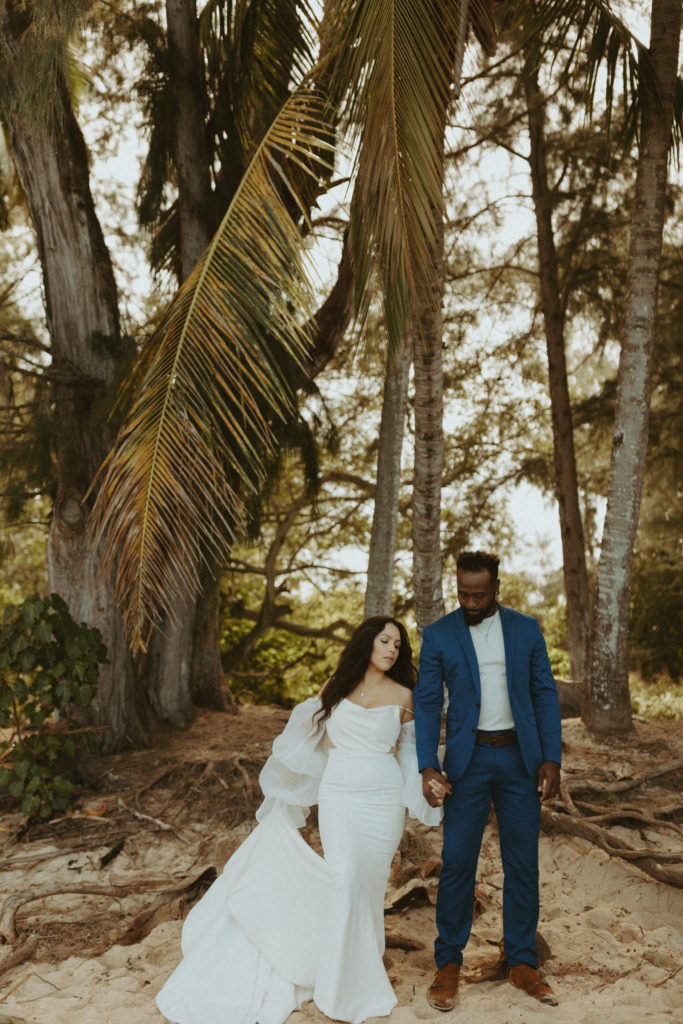 the elopement couple posing for Hawaii wedding photos