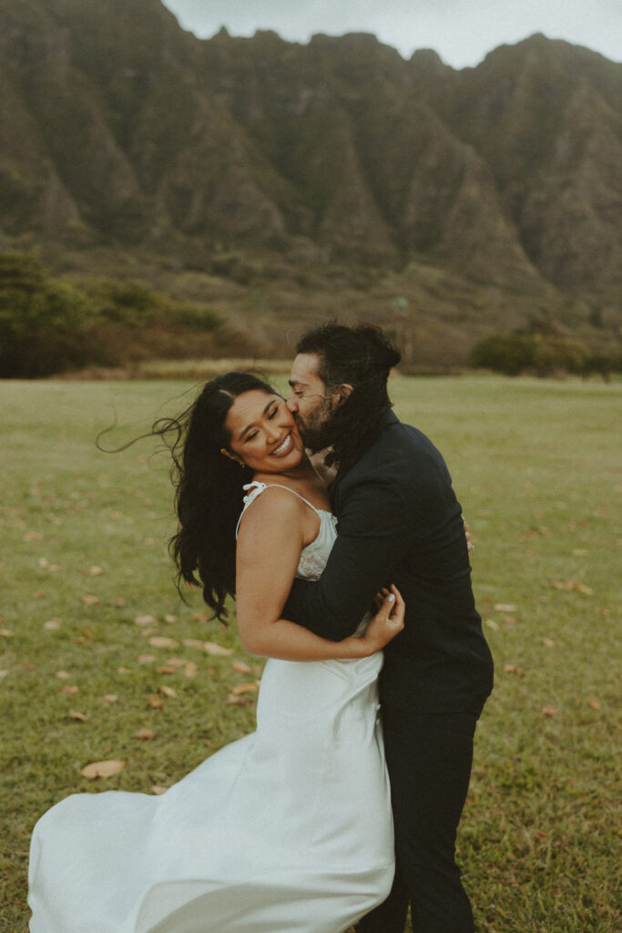 couple posing for their elopement photos in hawaii