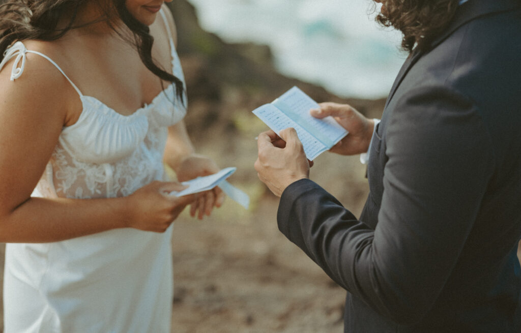 couple posing for their elopement photos in hawaii