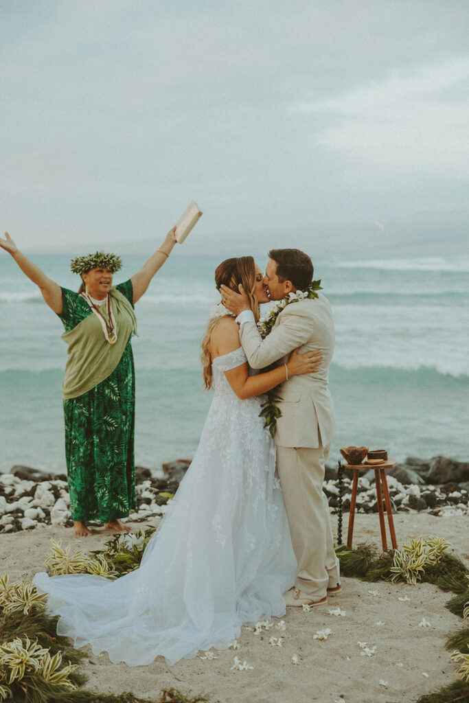 couple posing on big island for their wedding photos
