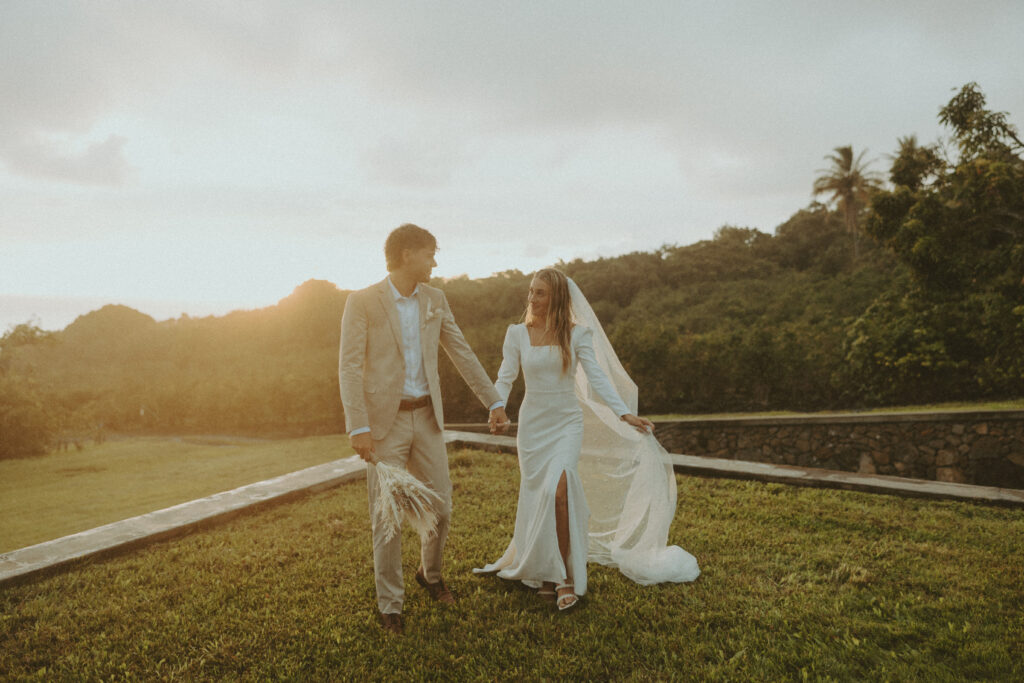 couple in hawaii posing for their wedding portraits - big island wedding
