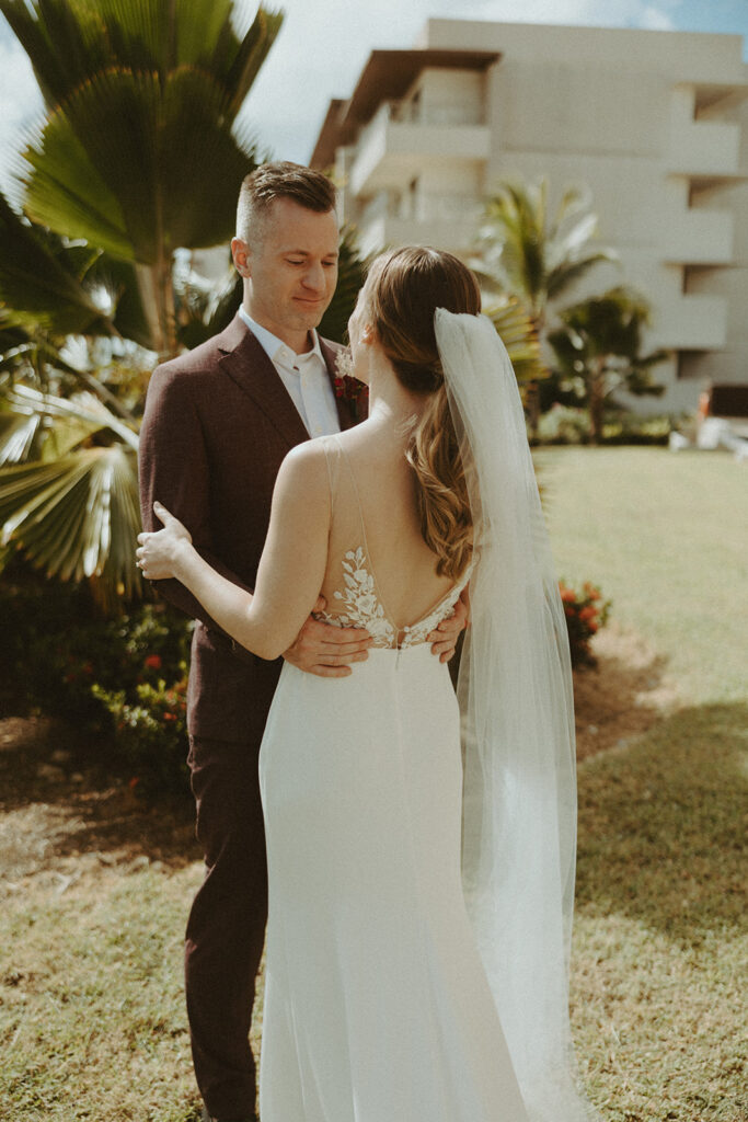 bride and groom posing for their wedding portraits in st lucia - valory evalyn
