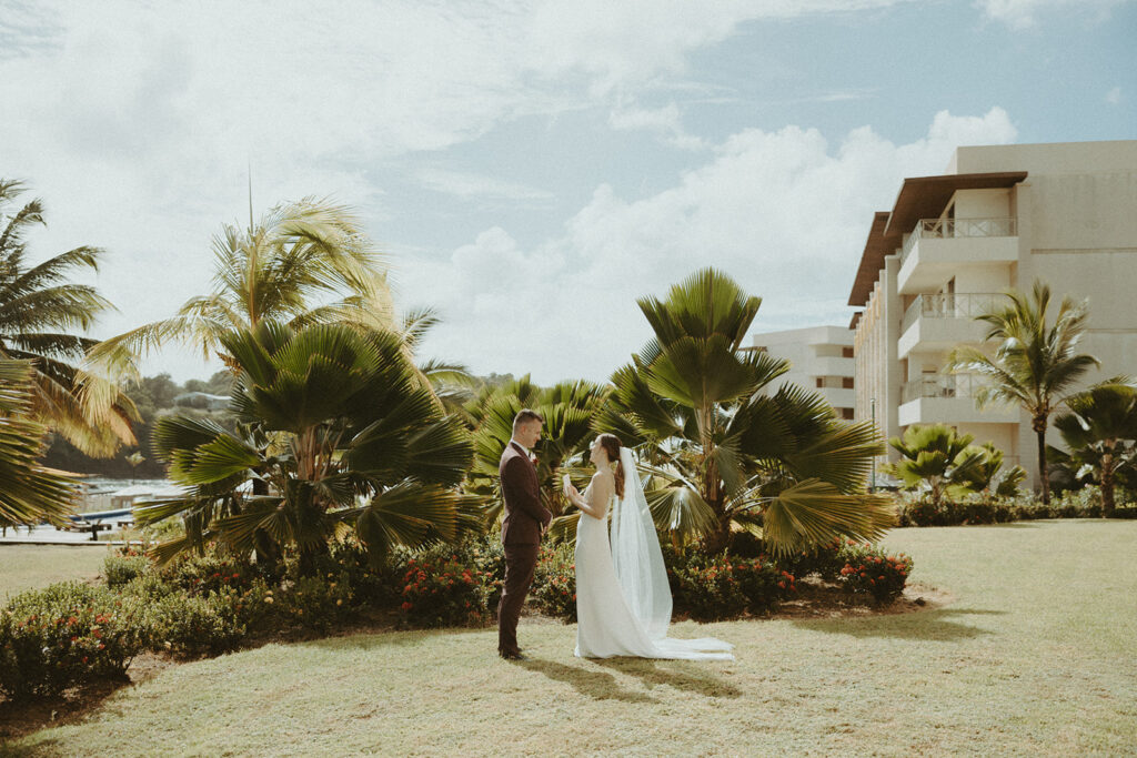 bride and groom posing for their wedding portraits in st lucia - valory evalyn
