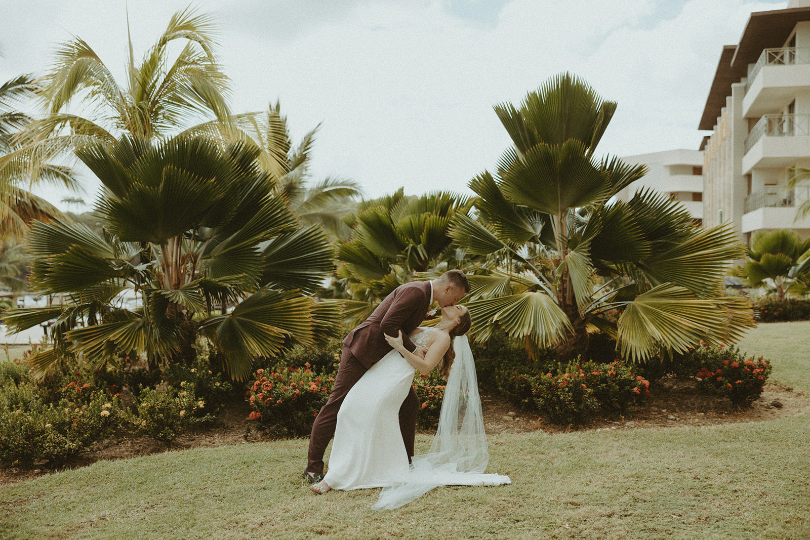 bride and groom posing for their wedding portraits in st lucia - valory evalyn