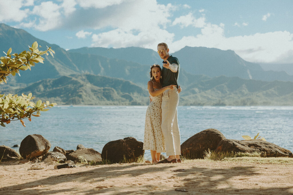 an engagement photoshoot in kauai on the beach during sunset