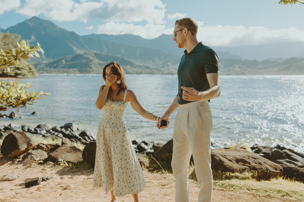 an engagement photoshoot in kauai on the beach during sunset