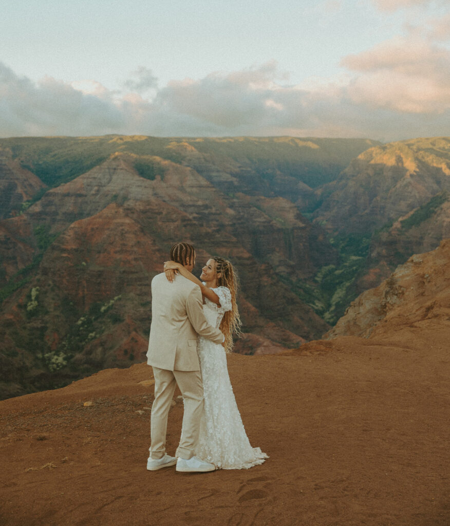 couple posing for engagement photos in hawaii

