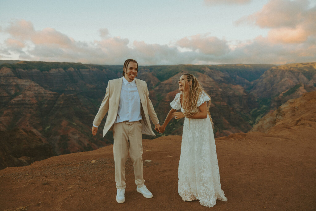 couple posing for engagement photos in hawaii

