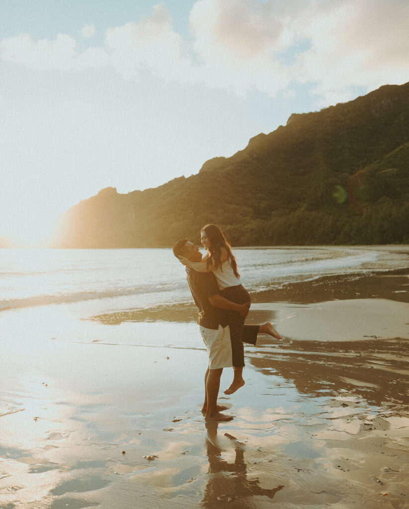 newlyweds posing in oahu during their honeymoon