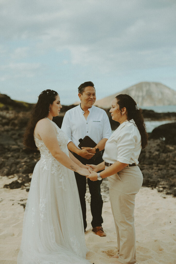 couple in hawaii on the beach for their wedding elopement