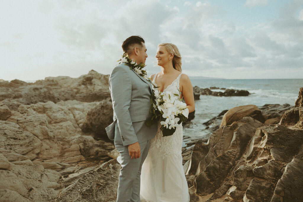 couple posing for their elopement photos in hawaii
