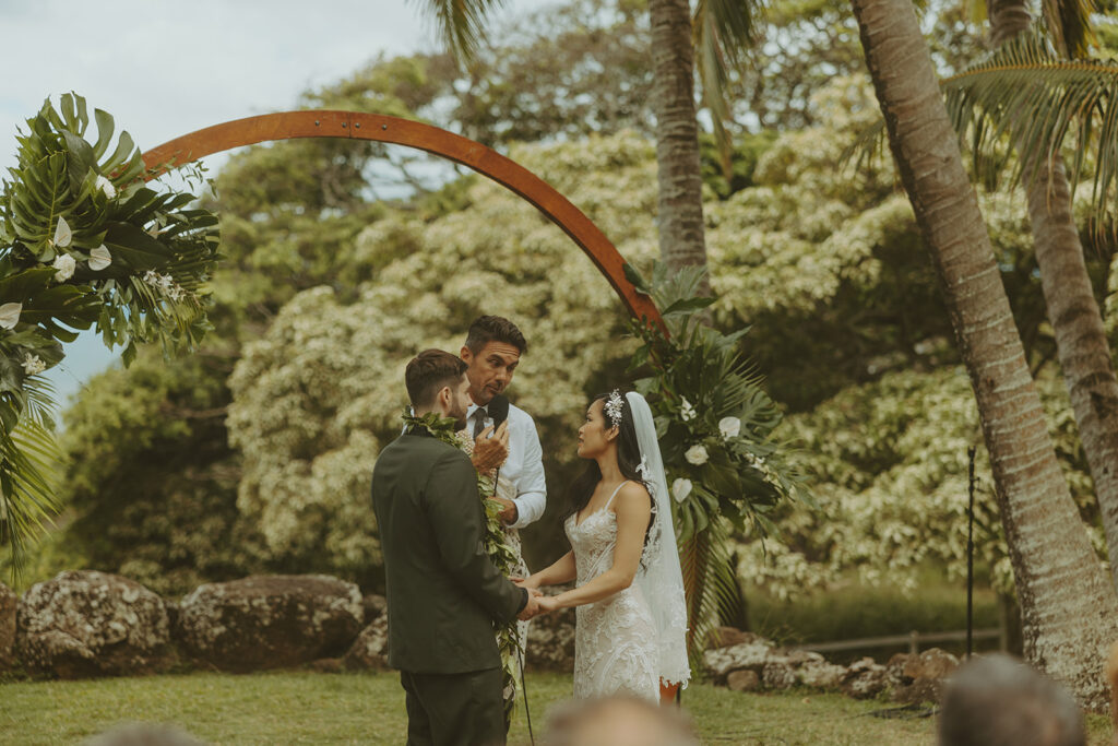 couple posing for wedding photos in hawaii
