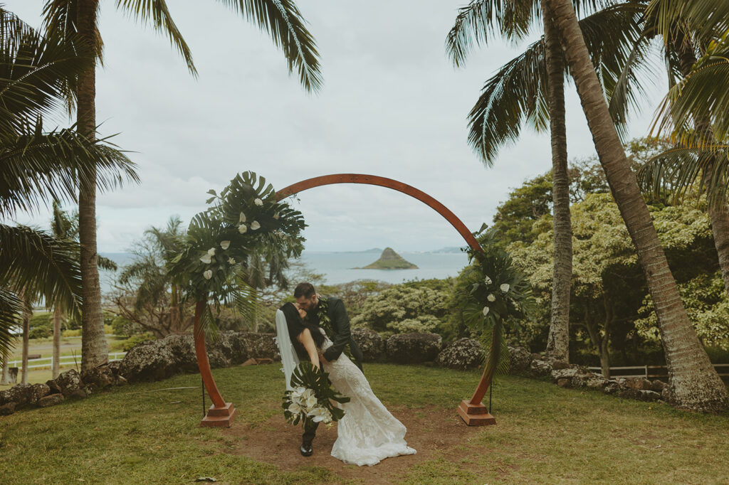 couple posing for wedding photos in hawaii
