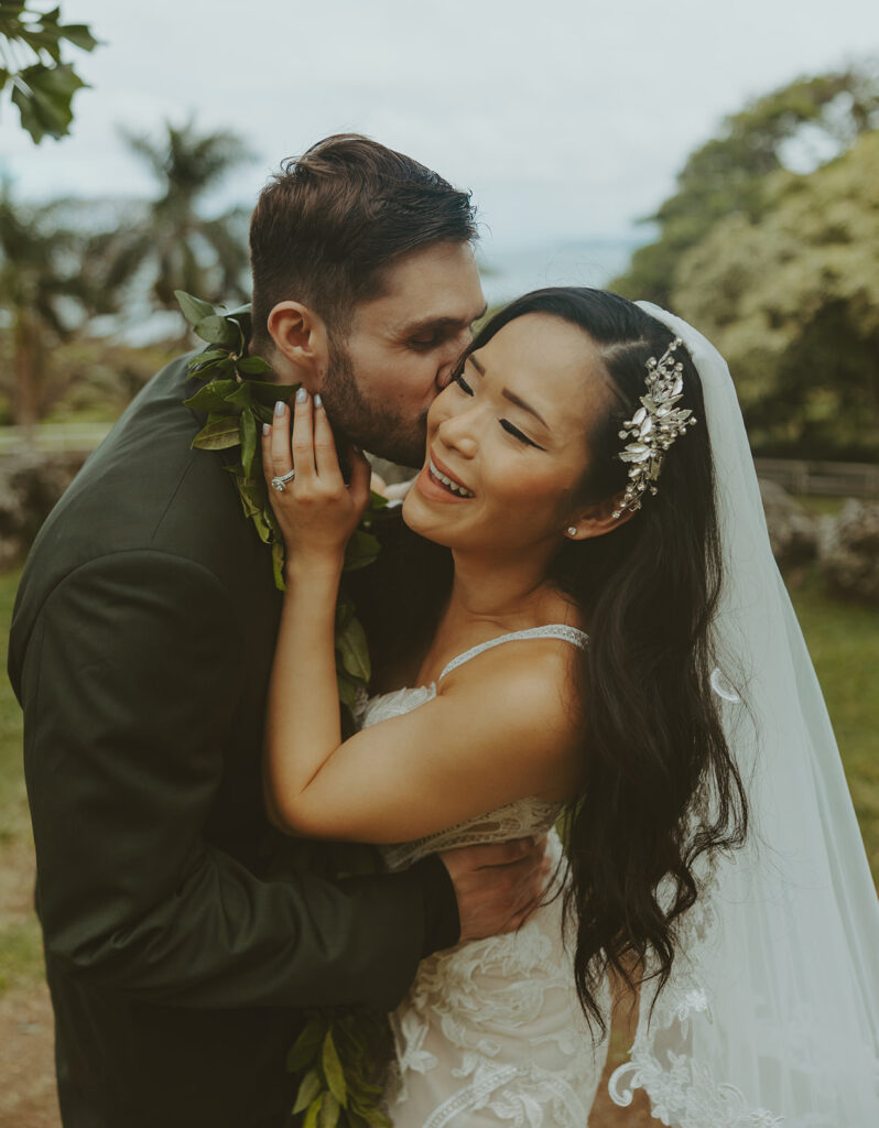 couple posing for wedding photos in hawaii
