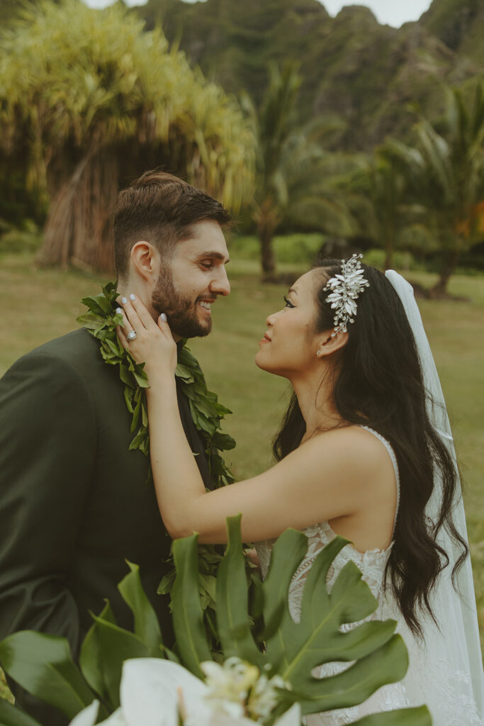 couple posing for wedding photos in hawaii
