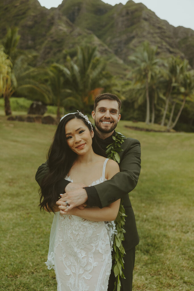 couple posing for wedding photos in hawaii