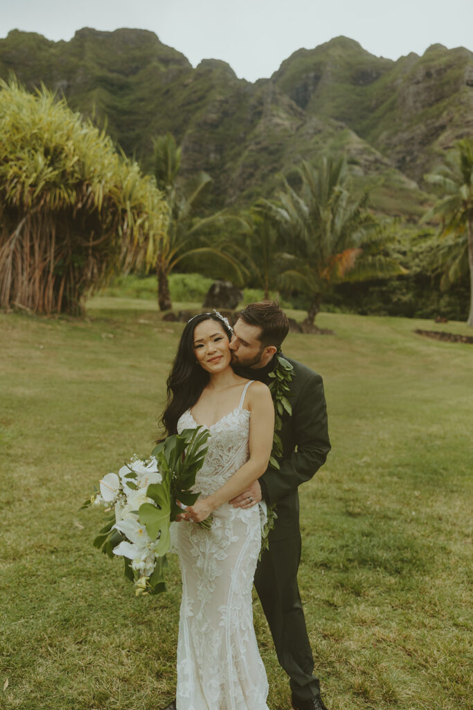 couple posing for wedding photos in hawaii
