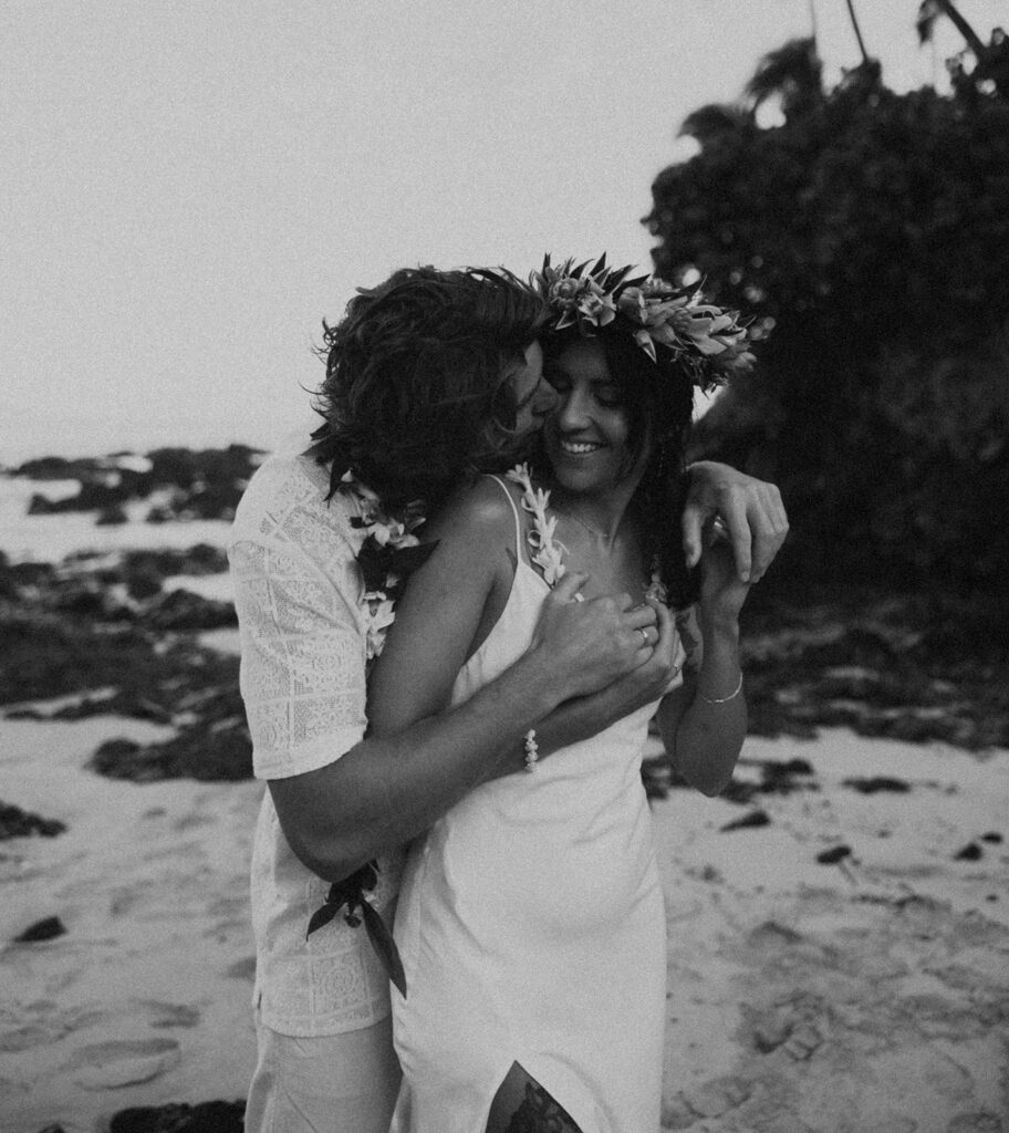 newlyweds taking elopement photos in hawaii
