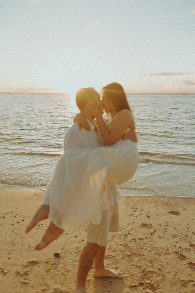 a beach side couples session in oahu
