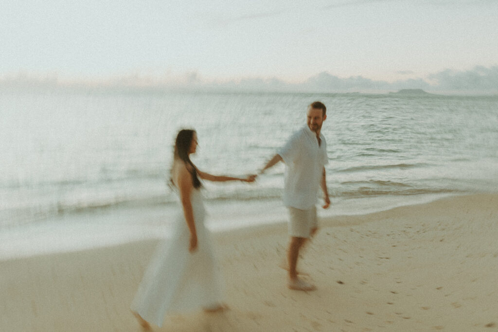 a beach side couples session in oahu
