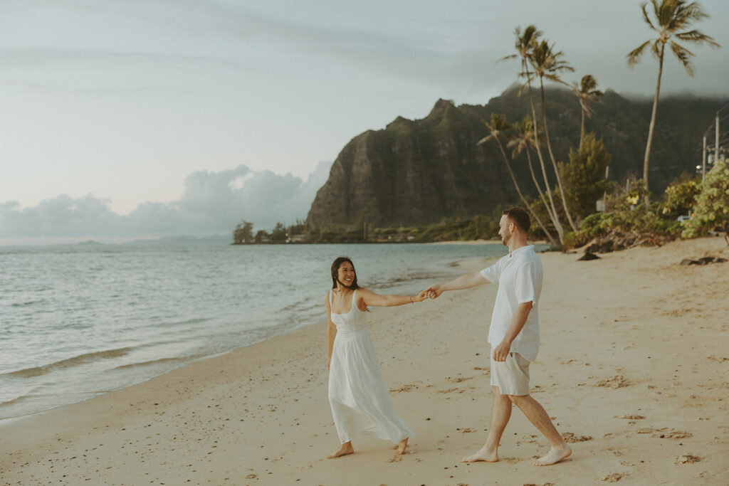 a beach side couples session in oahu
