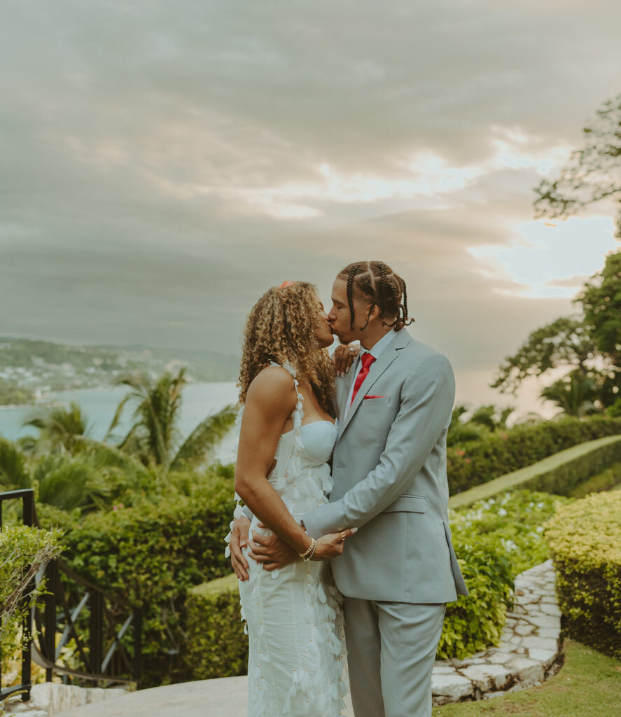 couple posing in jamaica for their destination wedding