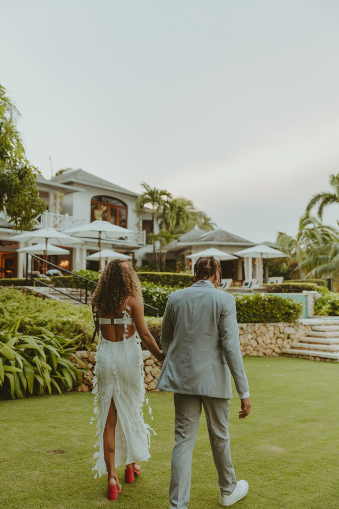 couple posing in jamaica for their destination wedding