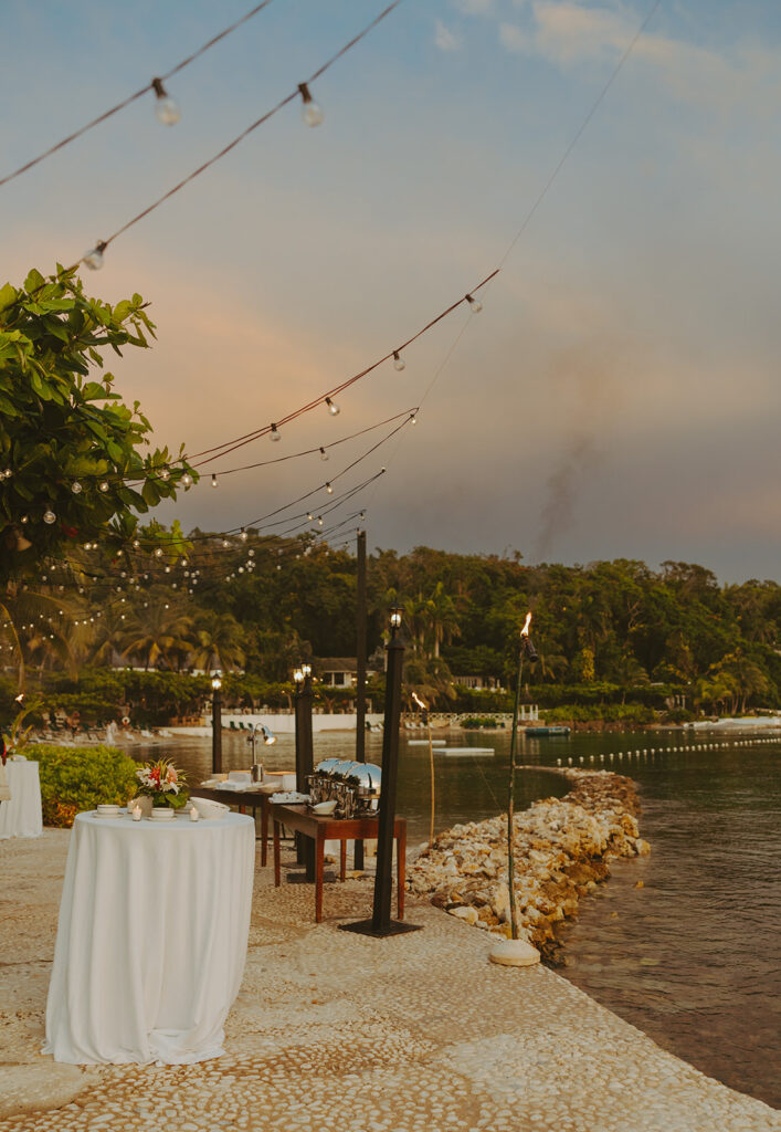 A romantic destination wedding ceremony overlooking the ocean in Jamaica
