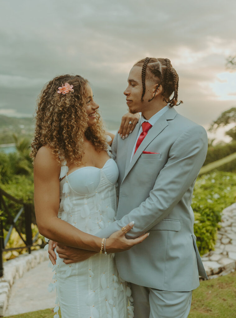 couple posing in jamaica for their destination wedding