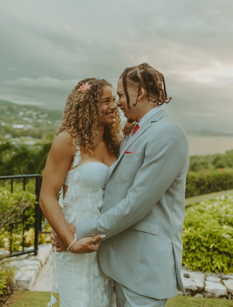 A romantic destination wedding ceremony overlooking the ocean in Jamaica
