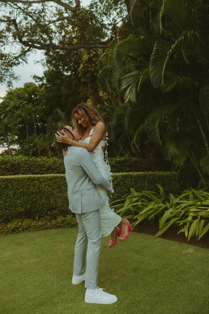 couple posing in jamaica for their destination wedding