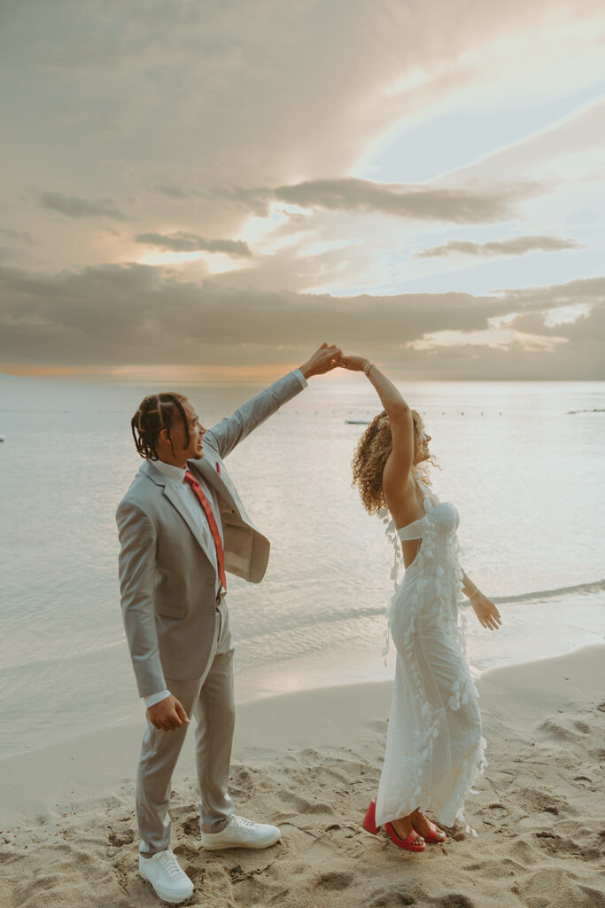 couple posing in jamaica for their destination wedding