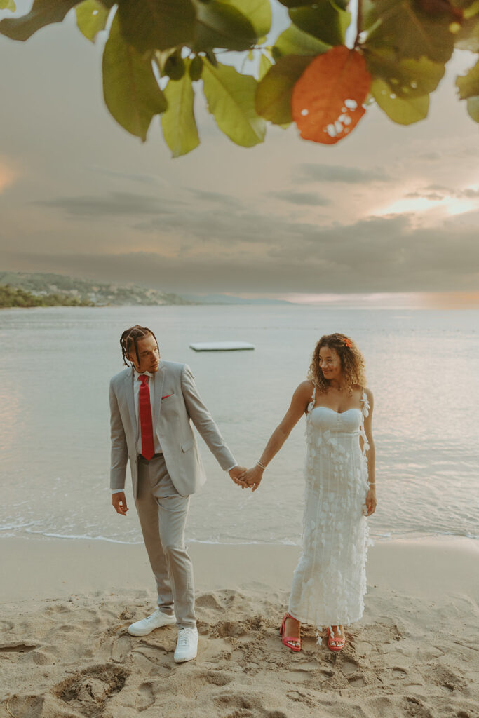 couple posing in jamaica for their destination wedding