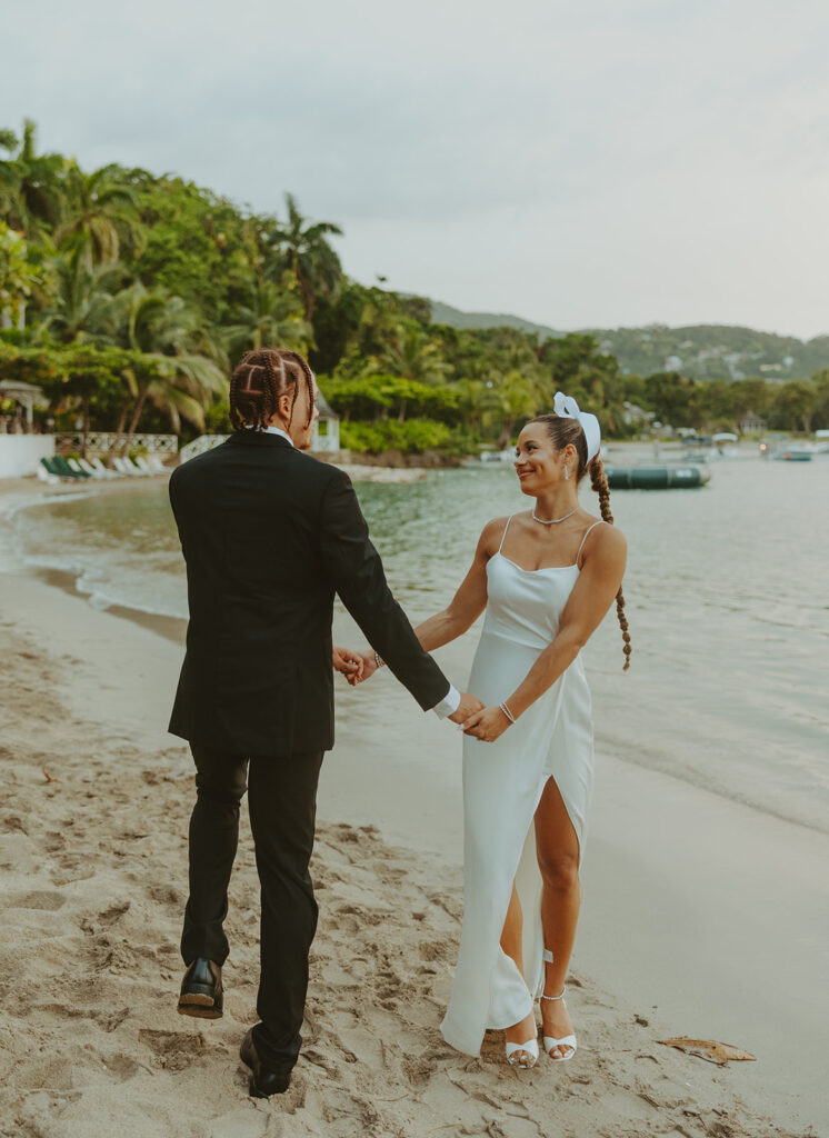 A romantic destination wedding ceremony overlooking the ocean in Jamaica
