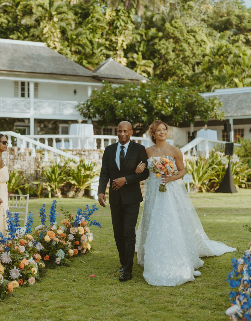 A romantic destination wedding ceremony overlooking the ocean in Jamaica
