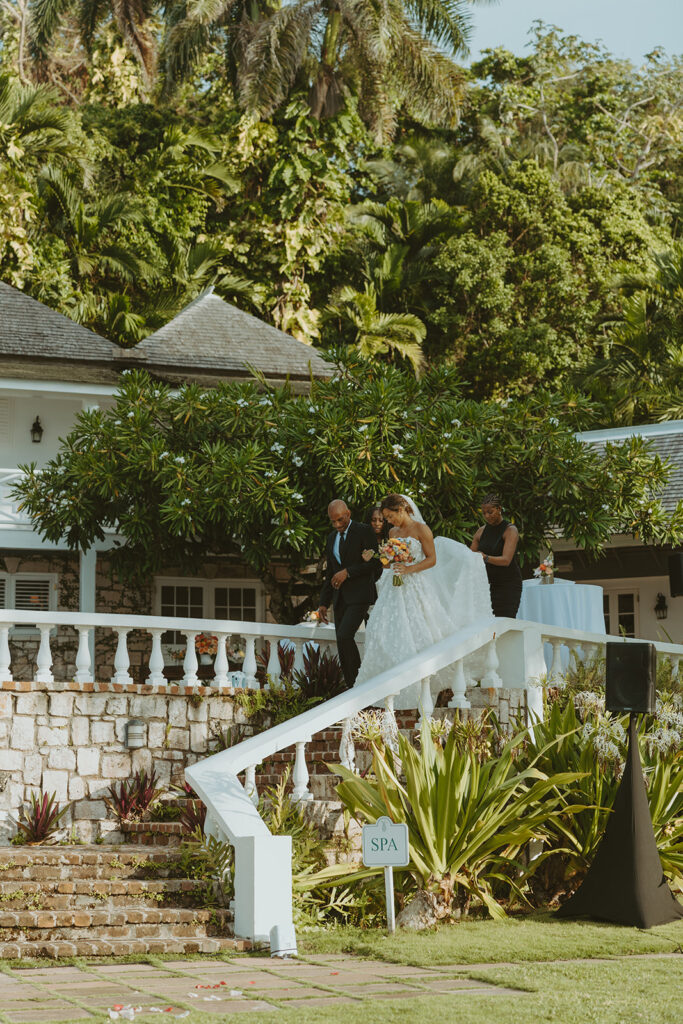 A romantic destination wedding ceremony overlooking the ocean in Jamaica
