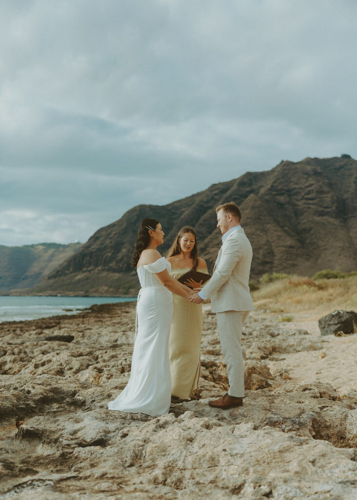 Bride and groom standing together during their intimate Oahu wedding
