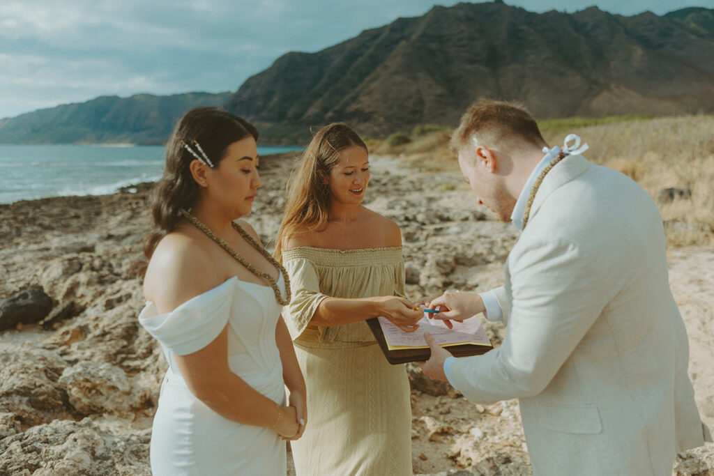Couple exchanging vows during an Oahu elopement ceremony
