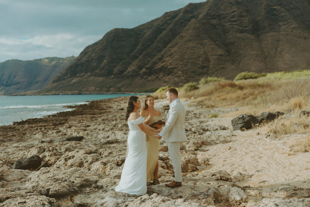 Couple exchanging vows during an Oahu elopement ceremony
